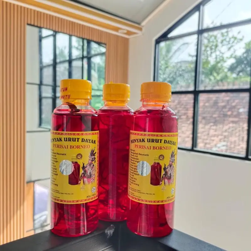 MINYAK URUT DAYAK KALIMANTAN IBU IDA 250 ML Minyak Pijat gosok 5