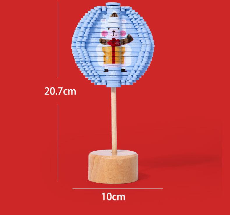 Product Introduction of Christmas Ornament Children's Educational Facial Makeup Rotating Lollipop Decompression Decompression Fei's Series Leaves Creative Toys 9