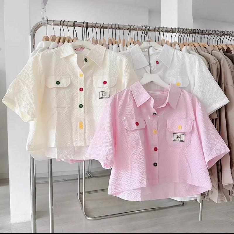  Áo sơ mi crotop phối nút màu chất đũi xốp mềm. Áo sơ mi nữ đính icon dễ thương Women 