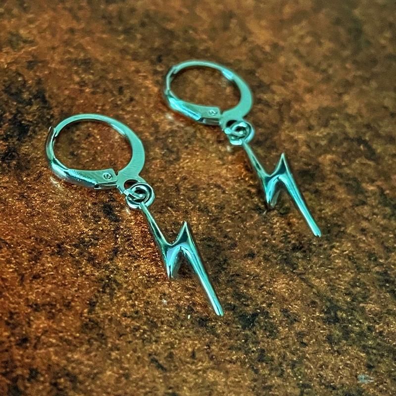 'Lightning' by Fox. Faux silver earrings. Unisex. Casual 1