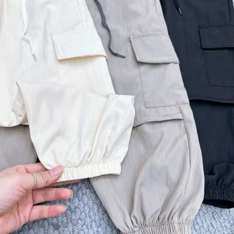 ( 13-40kg ) Quần Gió Trẻ Em Cho Bé Trai Bé Gái Chất Gió Nhăn Cao Cấp Dày Dặn Thoáng Mát 5