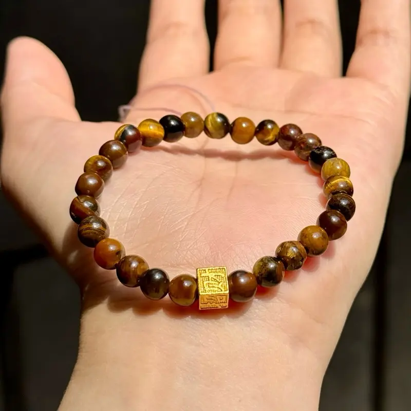 Vòng tay đá mắt hổ vàng nâu mix charm