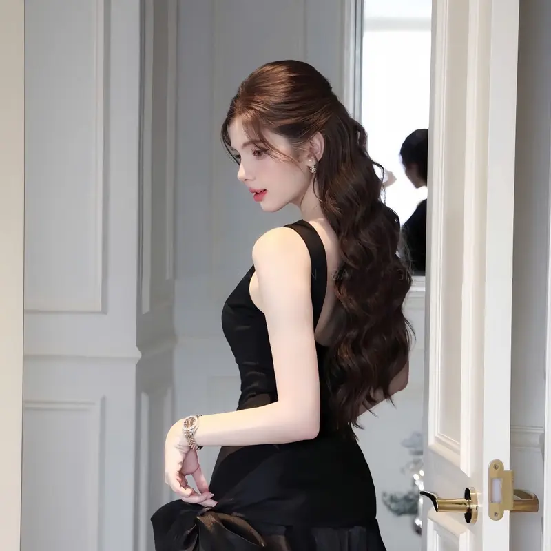 Đầm umi sát nách dáng ngắn đính nơ lệch 3