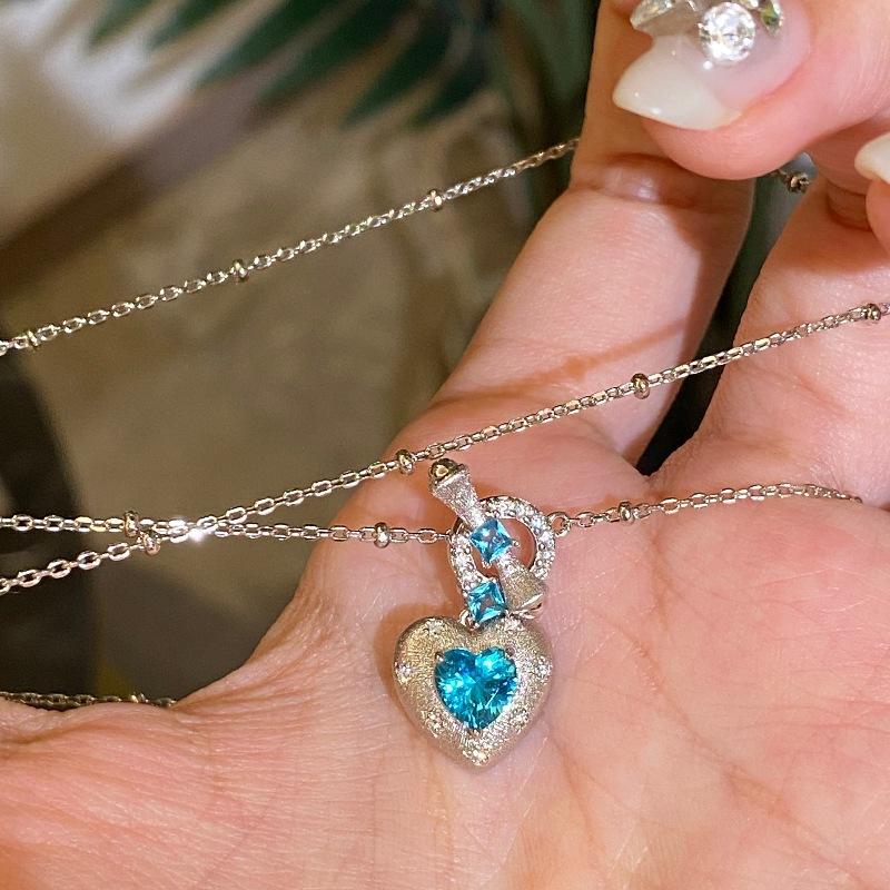 Product Introduction of Mild Luxury Retro High-Grade Paraiba Brushed Love Heart-Shaped Ring Necklace Ear Stud Inlaid Zircon Exquisite Women's Suit 3