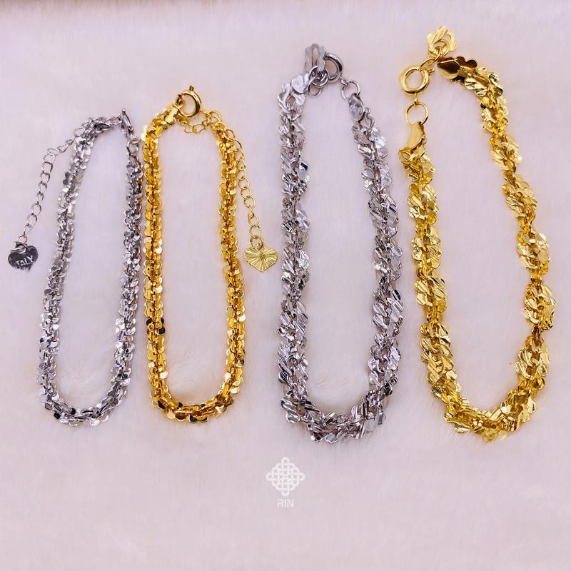 Lắc tay titan Vòng tay xoắn hoa mai màu vàng hoặc trắng chất liệu titan không phai không rỉ sét trangsucmoiluatuoi.RIN