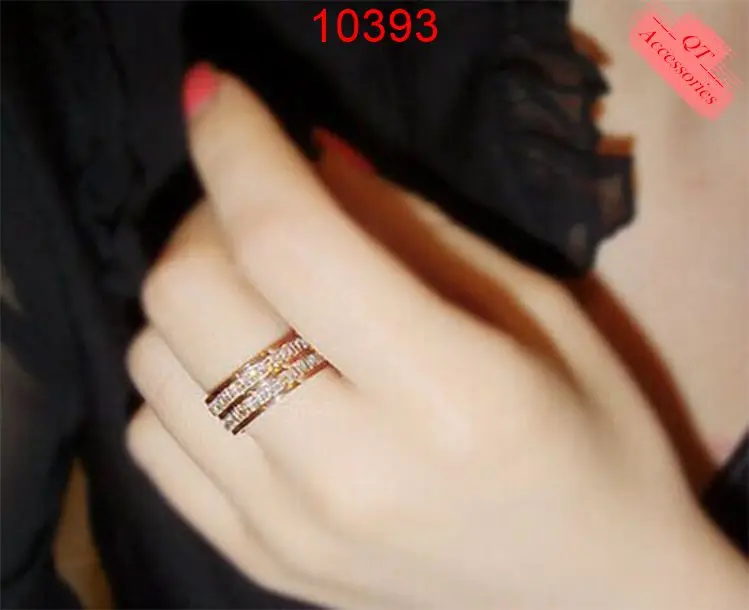 10393 - Nhẫn titan mạ vàng 99k hai hàng đá 1