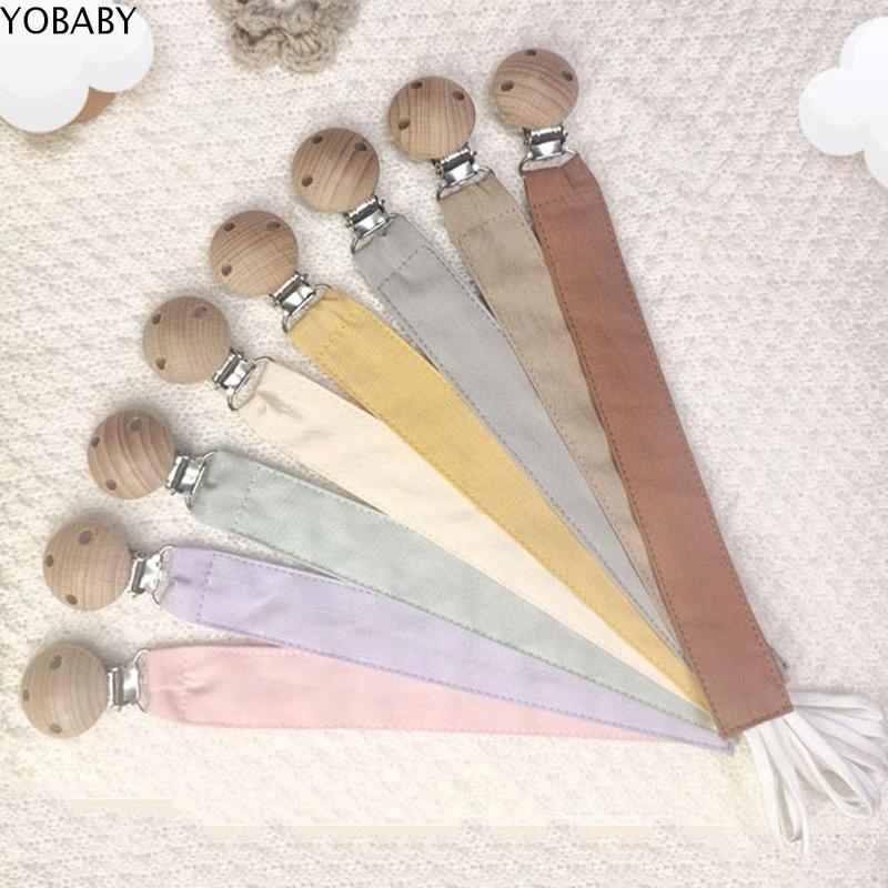Cute Solid Color Baby Cloth Pacifier Chain Wood Teether Toys - TikTok ...