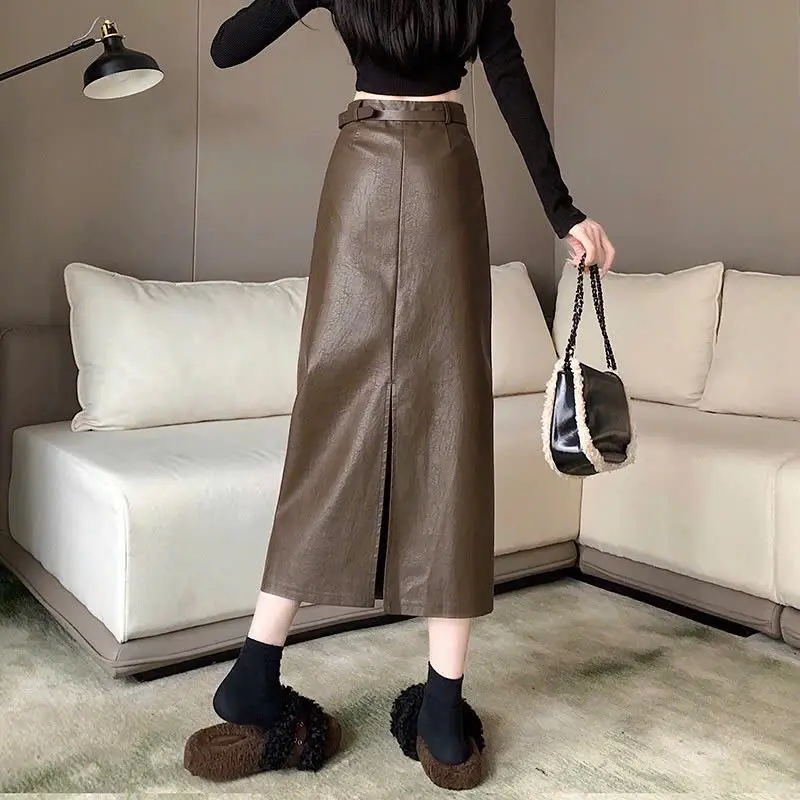 8018 .Chân váy da dài , dáng xuông A, xẻ sau, dài 80cm, kèm đai. chân  váy Nữ 1