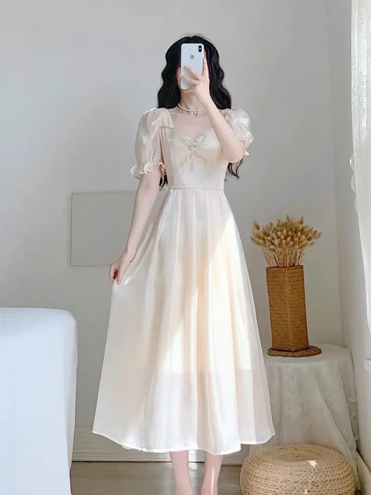 Váy lụa cao cấp, dáng xòe, nhúm ngực!