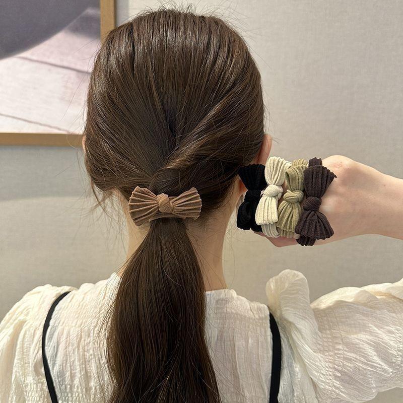 Product Introduction of Butterfly Knot 2024 Women Adult Children Ponytail Hair Ties Non-Damaging Hair Bands Towel Roll Braided Hair Ties 9