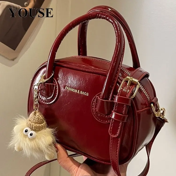 Túi xách nữ cầm tay đeo chéo da trơn kèm gấu phong cách đơn giản sang trọng đi chơi đi cf - SH79 Bag
