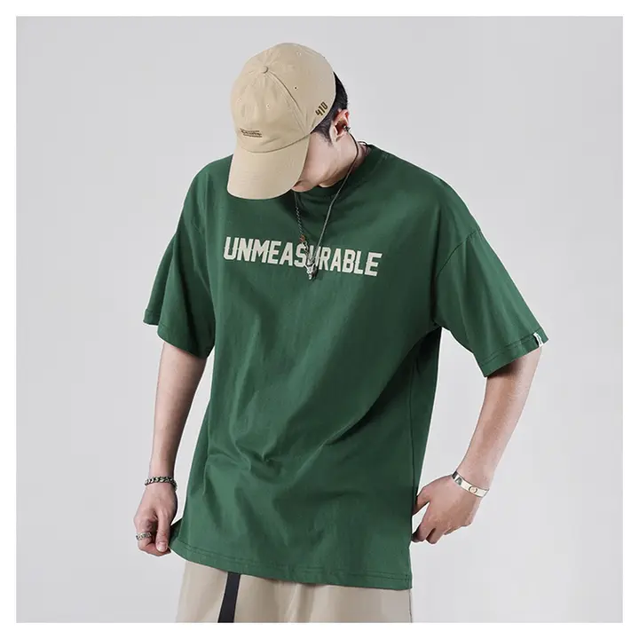 Áo thun nam HappyTee - Mẫu Áo thun Xanh lá form rộng tay ngắn in Unmeasurable vải cotton 100% cao cấp - HappyTee