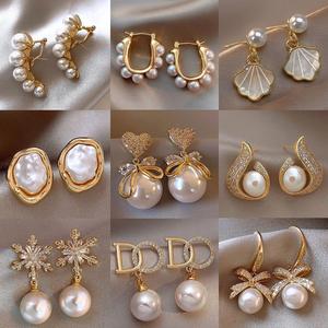 ต่างหูมุกเทียม สไตล์บาร็อคระดับไฮเอนด์ ดีไซน์เฉพาะ ราคาไม่แพง ดีไซน์โบว์สุดหรู กระดุมเซอร์โคเนียส่องแสง ทันสมัย เครื่องประดับหูผู้หญิง