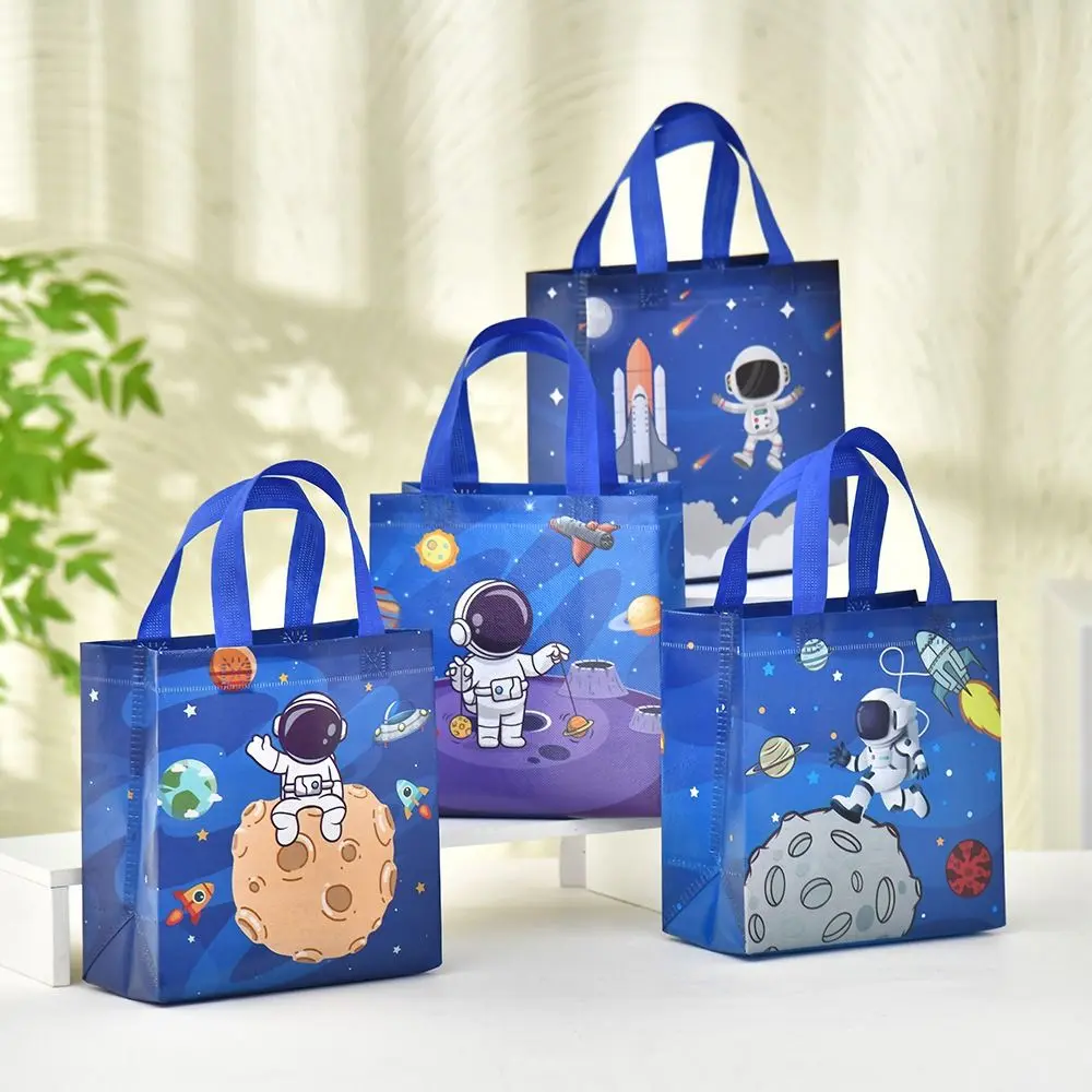 The New Non-woven Fabric Printed Handbag Cartoon Print Large Capacity Portable Shopping Pouch Astronaut Toy Storage Backpack