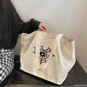 Black heart-shaped spider web Women's tote bag suitable for work, made by posyandu kia books, making it not only stylish but also sturdy, durable, resistant to deformation shoulder