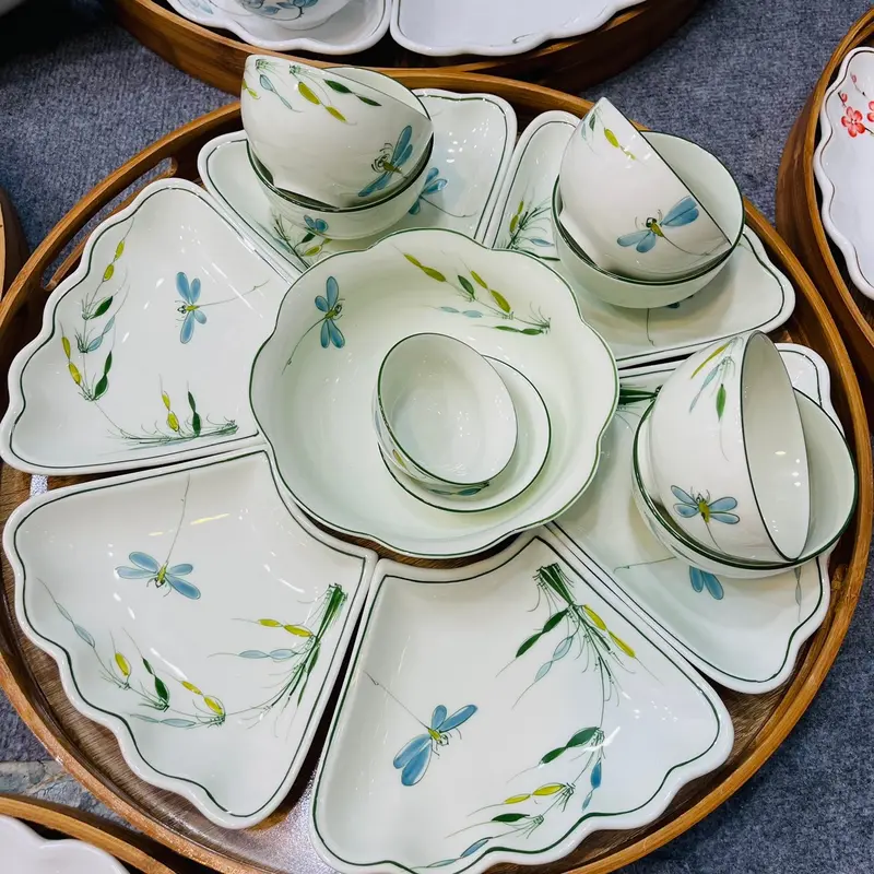 Bộ bát mặt trời sen , trúc chuồn men kem 0