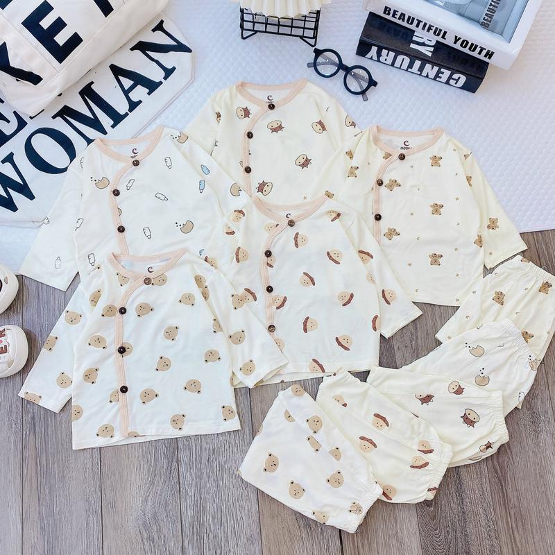  Bộ Dài Tay Moon Kids Phối Viền Nâu Be Vải Petit Thun Lạnh  Mềm Mại  Nền Kem Họa Tiết Hình Thú Dễ Thương Cho Bé Từ 3-9kg 