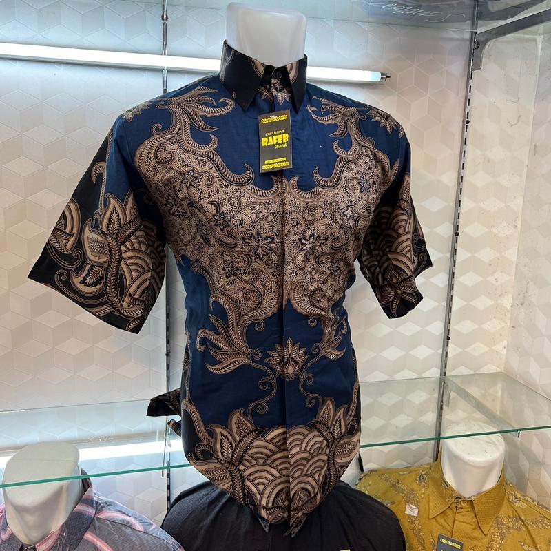 Hem batik pria lengan pendek di lapisi furing 1