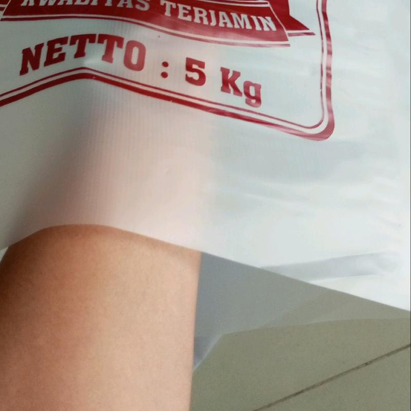 50 pcs plastik beras 5kg  dgn tentengan gambar melon dan rajalele (isi 50pcs) 2