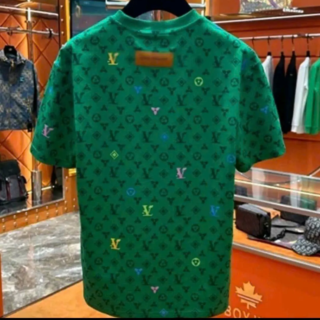 ÁO PHÔNG CỘC TAY NAM NỮ (T 009) VÀNG XANH KÈM HỌA TIẾT HOTTREN. CHẤT VẢI THOÁNG MÁT, CO DÃN