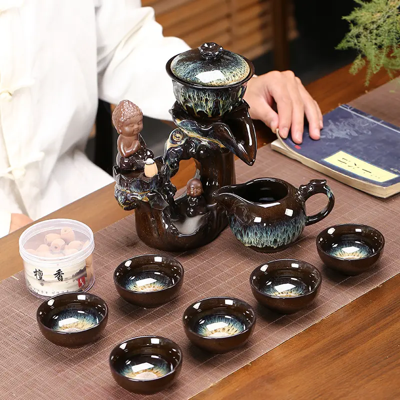 Bộ ấm chén uống trà, Bộ pha trà , Ấm trà xoay cao cấp - TẶNG KÈM HỘP TRẦM 45 NỤ