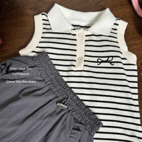 Set áo polo kẻ chân váy xám sz 100-140