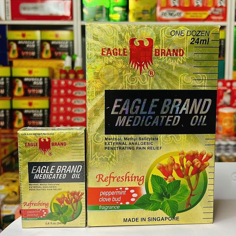 ( 1 chai Mỹ) Dầu Gió Vàng Con Ó Eagle Brand 24ml_ 2 nắp chuẩn Tiêu Chuẩn MỸ