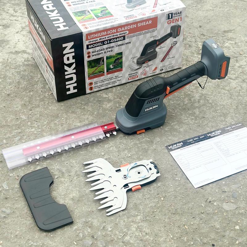 Máy Cắt Tỉa Cây, Hàng Rào Hukan G1 - GS400 Dùng Pin Phổ Thông M21 Tặng Kèm 2 Đầu Cắt
