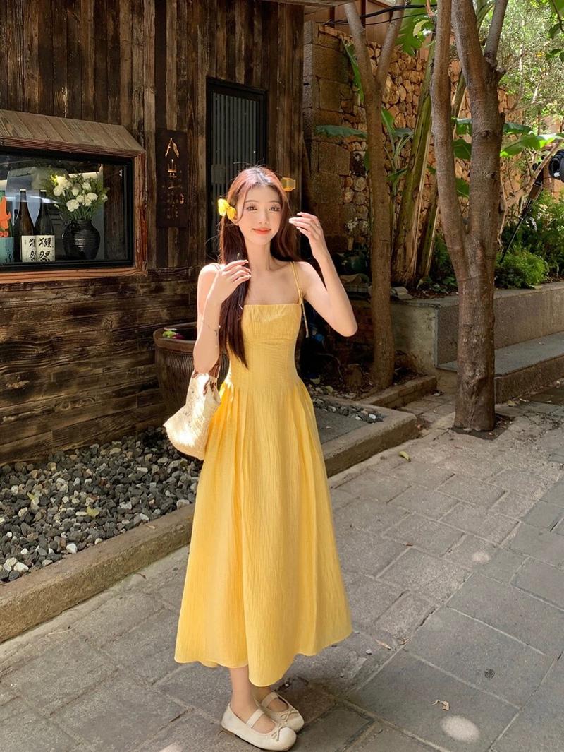 Product Introduction of French style short yellow camisole dress, women's waist cinching temperament long skirt, beach vacation dress 7