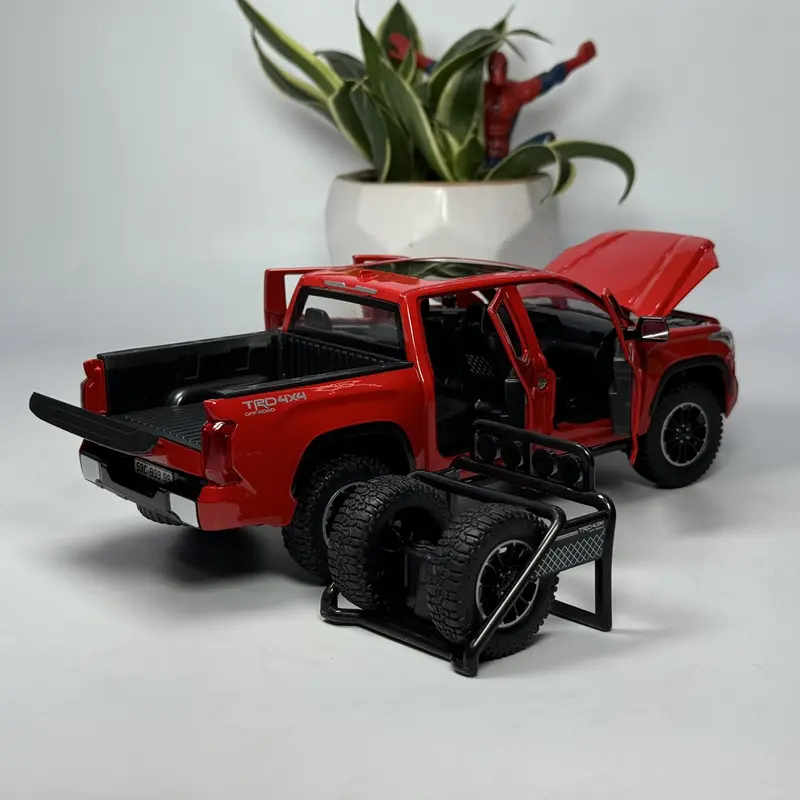 Mô hình xe bán tải Tô yo ta Tundra 4x4 tỷ lệ 1:24 bằng kim loại Tặng biển số VIP 8