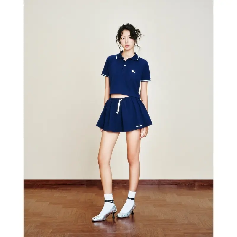 CARA Set lẻ áo polo croptop và chân váy ngắn Vilen năng động 4