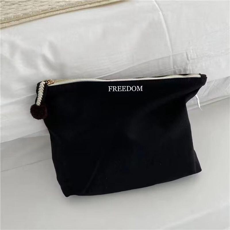 Product Introduction of Niche Cute Hand Canvas Makeup Bag Women's Japanese Ins Simple and Portable Large Capacity Skincare Storage Bag 2