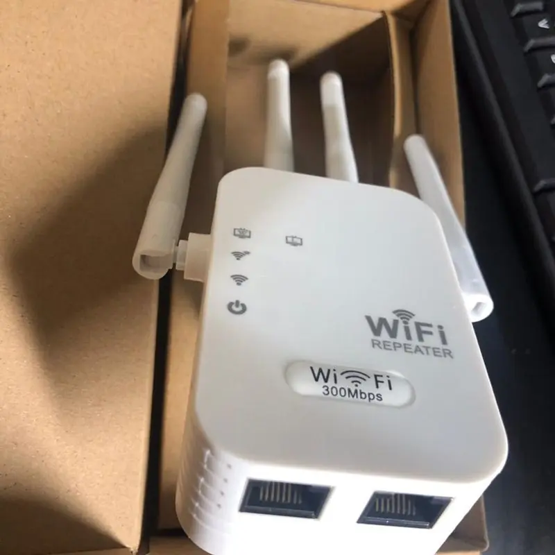 Bộ mở rộng sóng wifi 4 râu tốc độ 300mbps phù hợp với gia đình và văn phòng máy tính ti vi camera - Chuẩn N - Phát xuyên tường - Có 2 cổng LAN 1