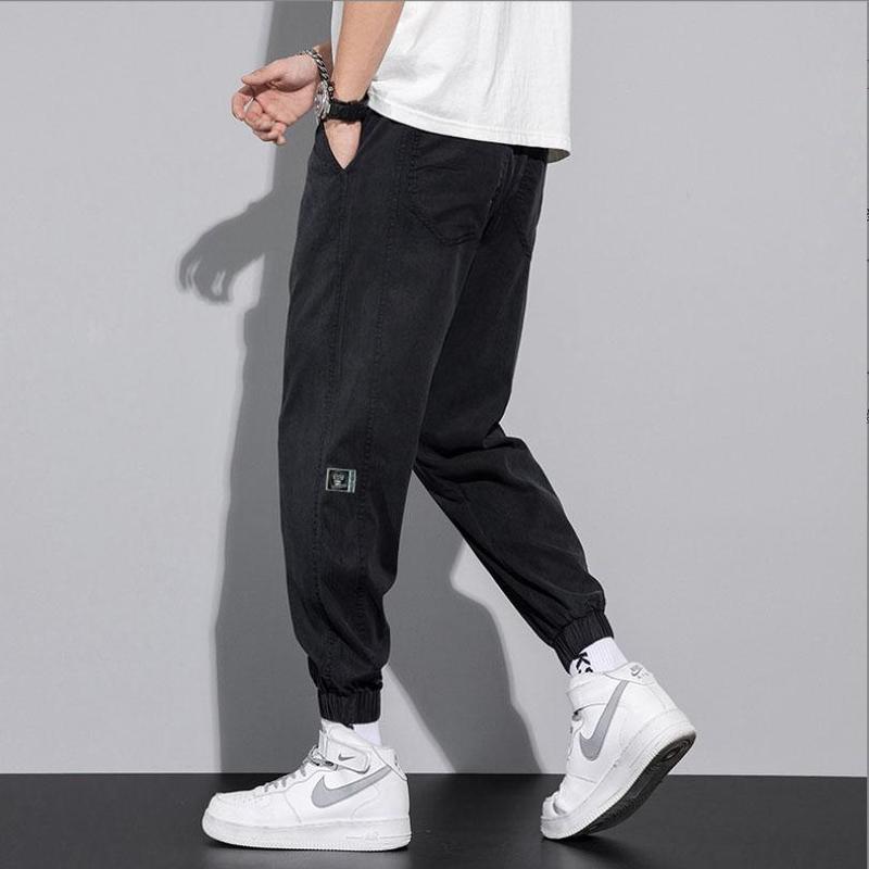 Quần Jeans jogger nam nữ unisex màu đen logo thêu canhj bó gấu lưng chun 11 Menswear Pants Có Túi