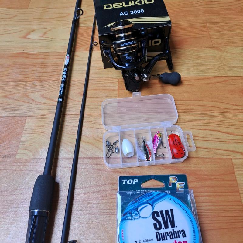 bộ combo cần câu lure sói đen kèm máy ac 2000 và hộp mồi lure