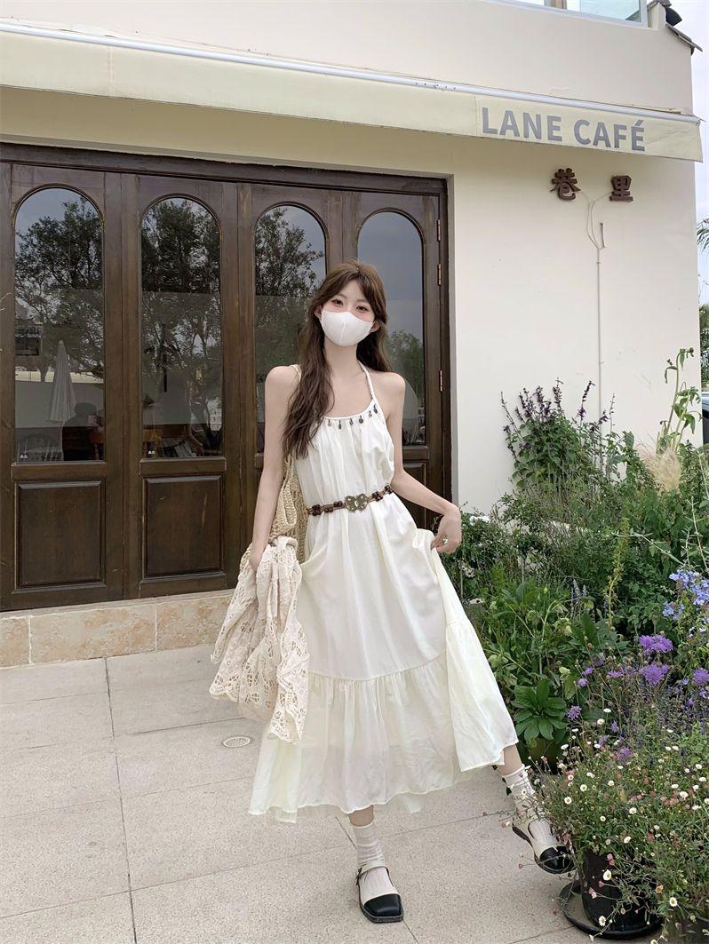 Product Introduction of Simia Hollow Suspender Dress Tassel Long Dress Two-piece Set Sunscreen Cardigan Mori 9