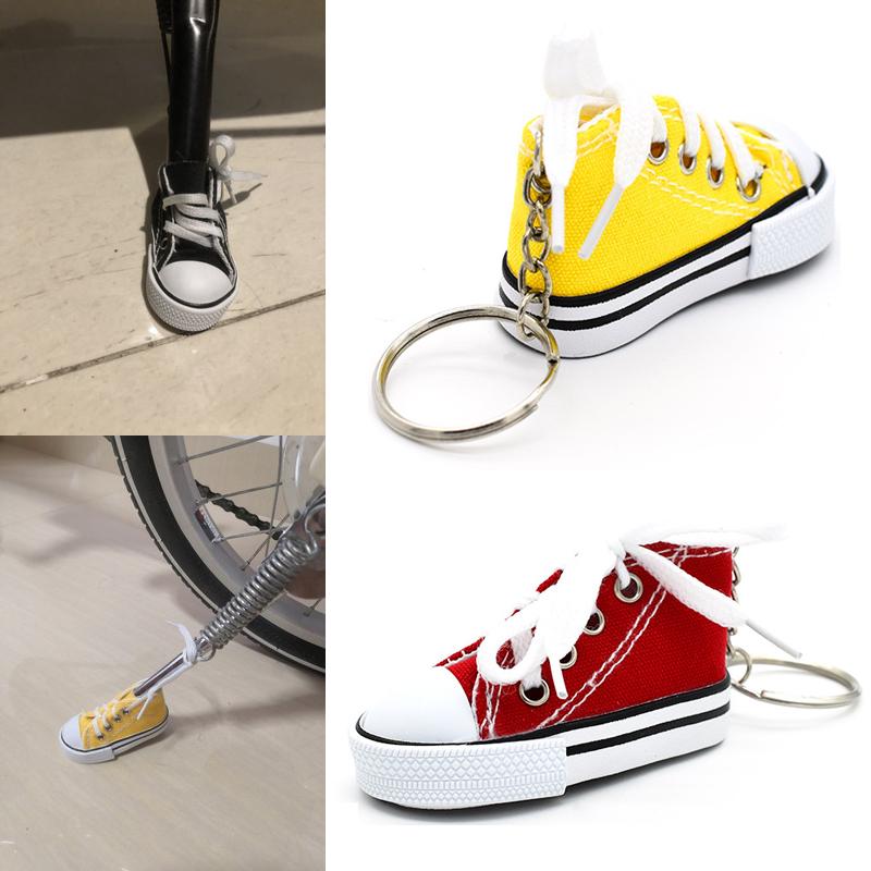 Product Introduction of Motorcycle Bicycle Foot Support Mini Cute Shoes Creative Car Keychains for Motorbike Bike Tripod Canvas Shoes Decor Cover 3