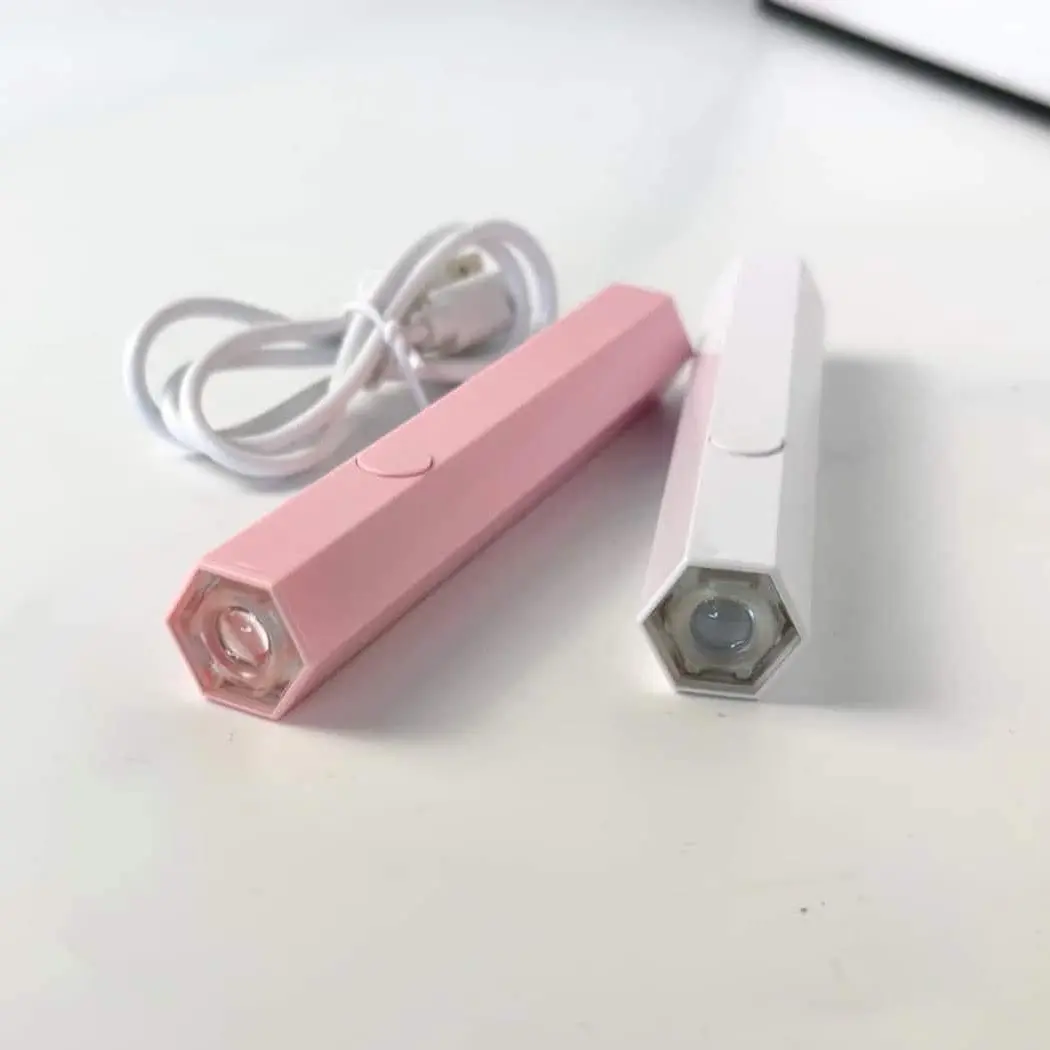Đèn hơ móng mini . Tiện lợi
