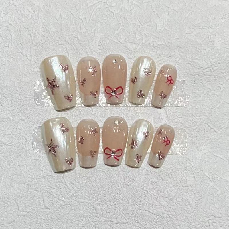Product Introduction of Simple French Removable Press On Nails Coffin Bow Metallic Nail Gems Classy Nails Hand Drawn Nail Tips 7