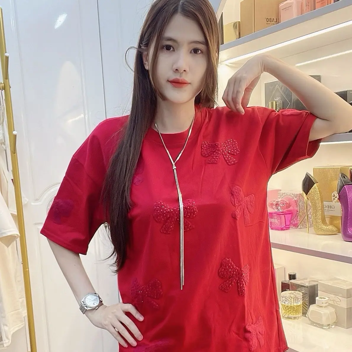 Áo phông nữ cổ tròn dập nơ nổi chất cotton