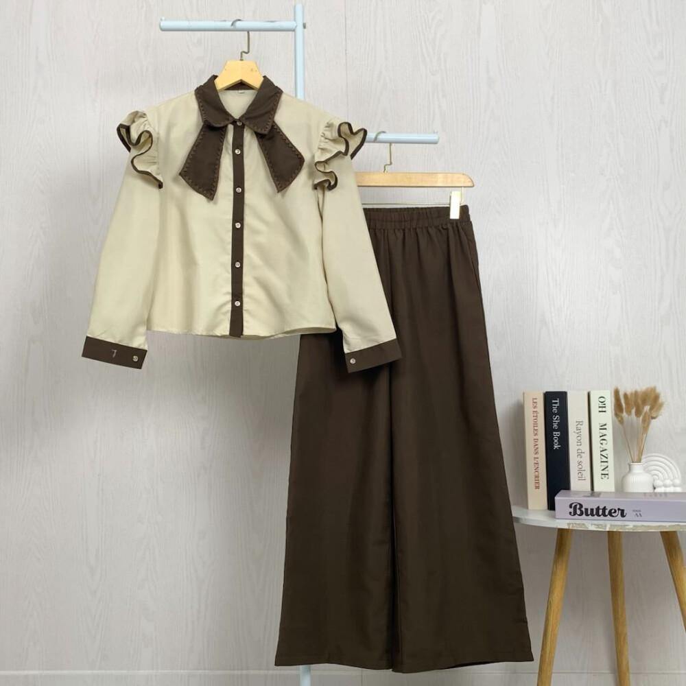 Asaya Setelan dua potong atasan dan celana longgar dengan kombinasi warna yang stylish dan terbaru.