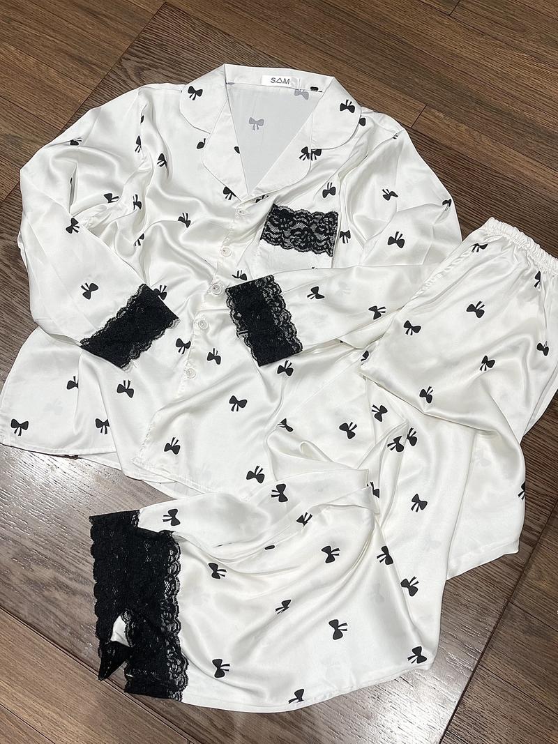 Product Introduction of M101 NHỌ PYJAMAS Bộ mặc nhà tiểu thư dài tay , có phối ren , hoạ tiết NƠ ĐEN chất lụa tơ tằm  . Ảnh tự chụp ( nền trắng kem mang bra cùng màu ) 3