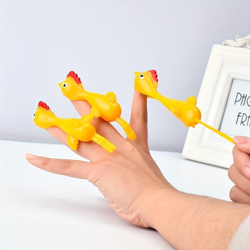 Product Introduction of 1pc/3pcs, Ejection Toys Slingshot Lightweight Flying Chicken Finger Prank Catapult Toys Chicken Finger Ejection Toys Kids Toys 1