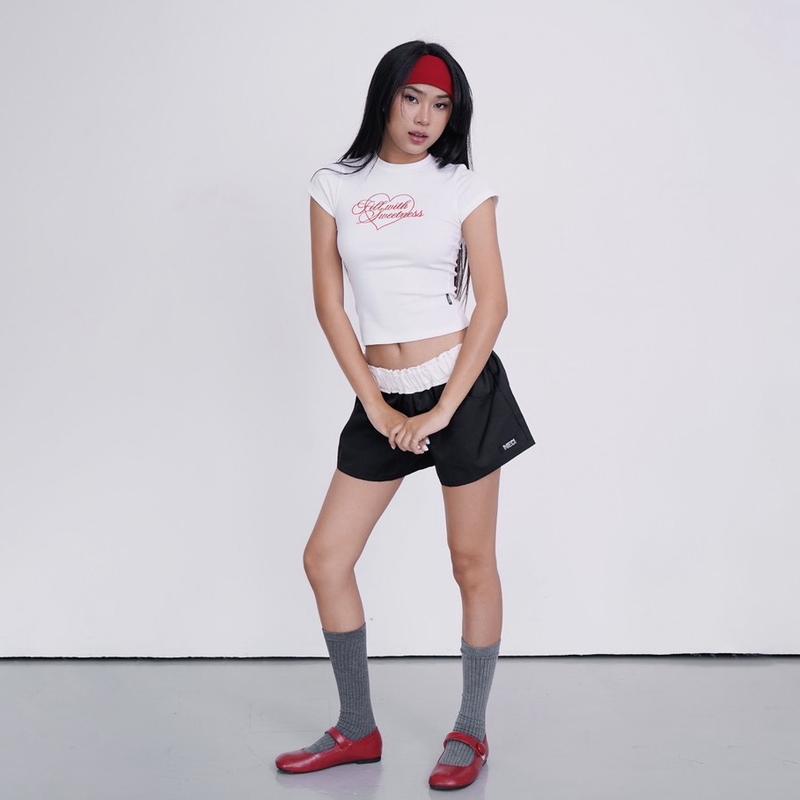 [ LOGO KNIT SHORT ] Quần short dù nữ NECI CLUB cạp trễ ống rộng, kiểu dáng thể thao phối lưng, tag logo Sport 4