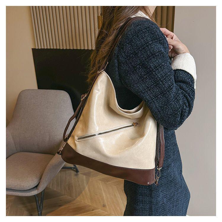 Product Introduction of Retro Large Capacity Commuter Backpack for Women 2023 New Niche Casual Easy Matching Tote Bag Crossbody Shoulder Backpack 19
