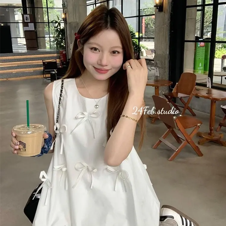 [SET55] Set áo ba lỗ kèm chân váy xếp li dáng ngắn đính nơ phong cách tiểu thư Hàn Quốc 3