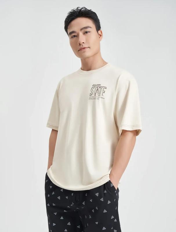 Áo phông nam có hình in CANIFA 8TS24C004