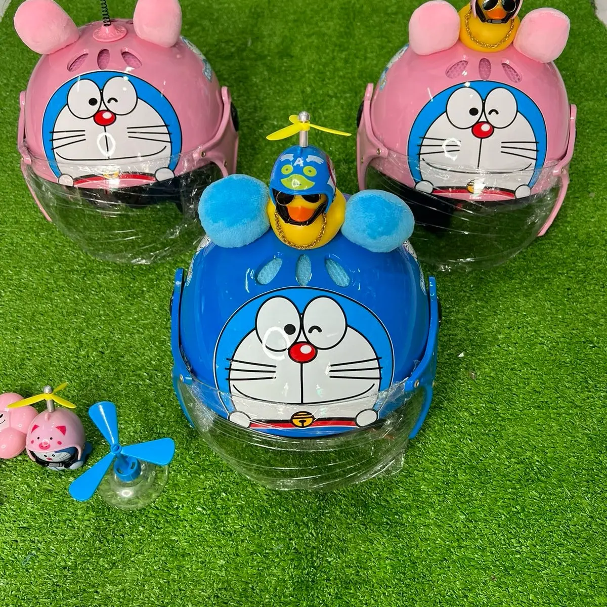 Nón Doraemon Dành cho bé từ 3 đến 8 tuổi Kèm theo phụ kiện siêu cu te ( + vịt + chong + dorrimon)