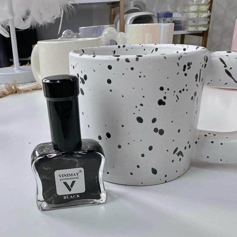 Cồn loang lẻ 2 màu trắng, đen