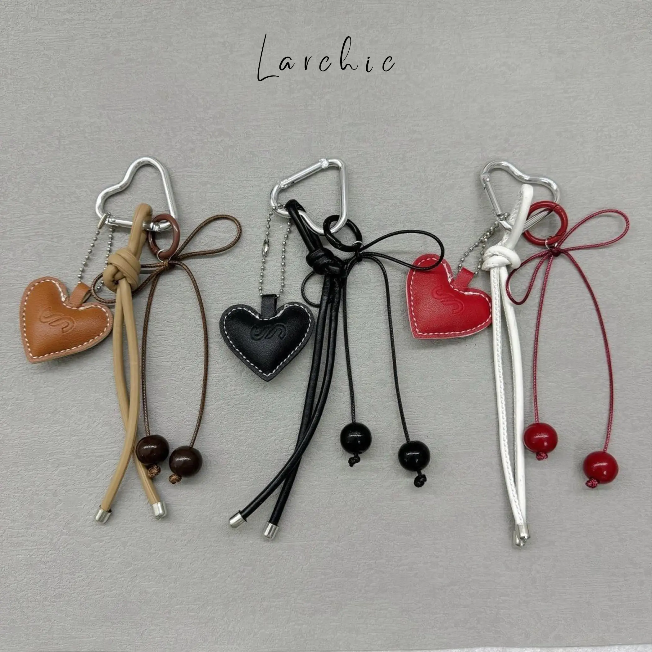 Charm túi xách, charm da túi xách, phụ kiện túi xách hình trái tim bằng da Larchic LCPK5
